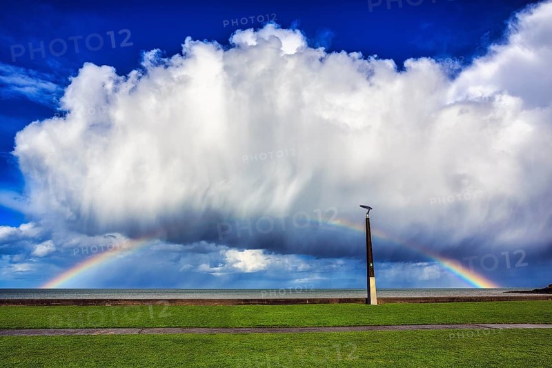 Seaside promenade, dramatic cloudy sky with rainbow, Bray, Wicklow, Ireland, Europe