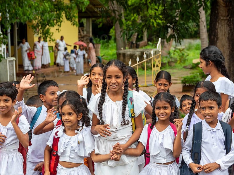 Group of school children, girls and boys in white school clothes, Dambulla, Sri Lanka, Asia