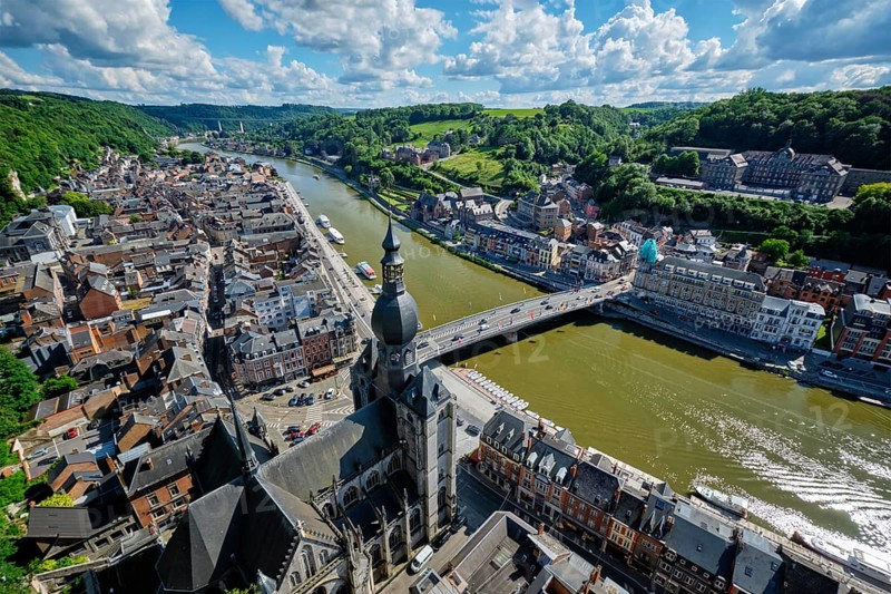 Aerial view of Dinant town, Collegiate Church of Notre Dame de Dinant, River Meuse and Pont Charles de Gaulle bridge from Dinant Citadel. Dinant, Belgium, Europe