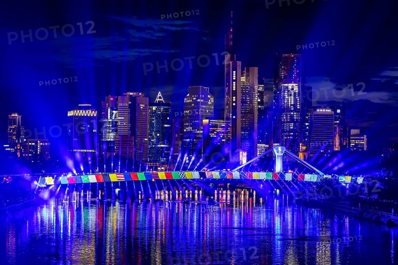 On Wednesday, 12 June 2024, the city of Frankfurt am Main will celebrate the start of the European Football Championship with a spectacular light show from 22:30. The eastern side of the Flößerbrücke bridge will be transformed into a spectacular spectacle of light and colour in the colours of the 24 participating nations, Frankfurt am Main, Hesse, Germany, Europe