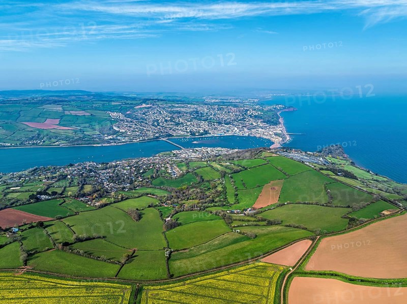Rapeseed fields over the River Teign from a drone, Teignmouth, Shaldon, Devon, England, United Kingdom, Europe