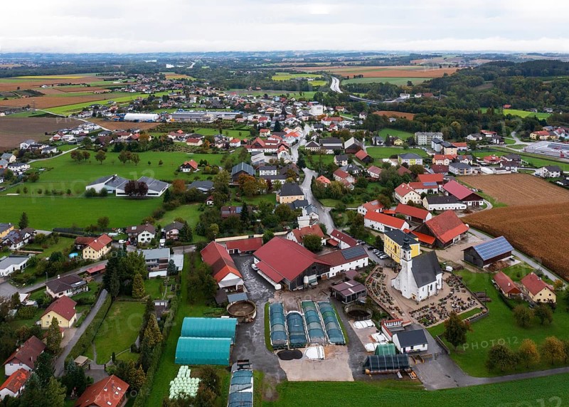 Drone image, residential buildings, view of village with church, Antiesenhofen, Innviertel, Upper Austria, Austria, Europe