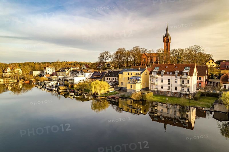 The town of Feldberg on Feldberger Haussee with the town church seen from the air, Feldberger Seenlandschaft, Mecklenburg-Vorpommern, Germany, Europe