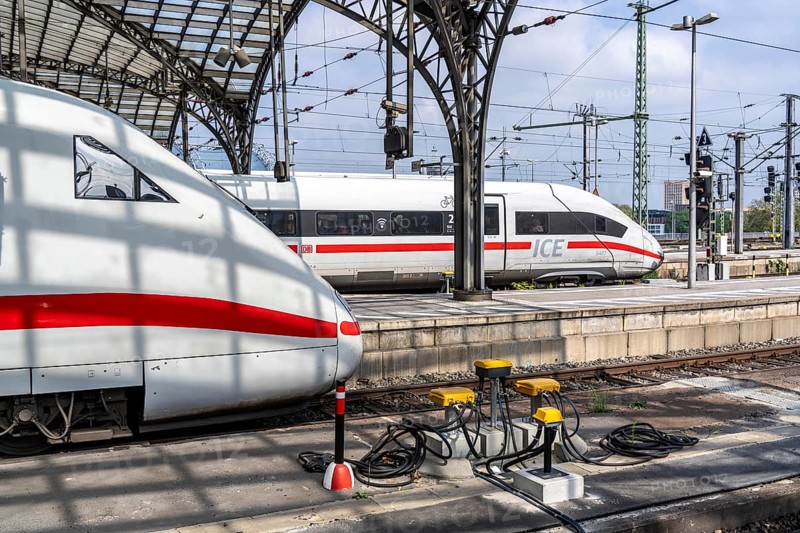 Digitalisation at Deutsche Bahn, in the yellow cable protection and distribution boxes the data cables from various sensors, such as axle counters, signals, points, RFID recording devices, etc., converge on the tracks, from here they are sent to the digital interlocking technology to record data for controlling rail traffic, Cologne, North Rhine-Westphalia, Germany, Europe