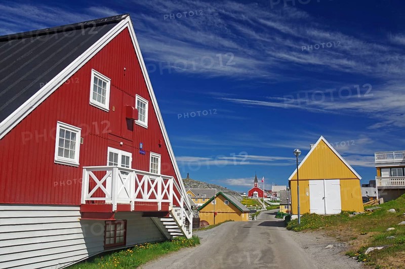Colourful Scandinavian houses along a quiet street under a blue sky, old town of the capital of Greenland, Nuuk, Greenland, Denmark, North America
