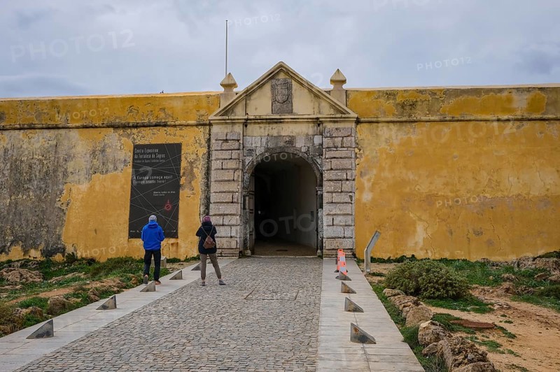 Sagres, Algarve, Portugal - Entrance gate to the Fortaleza de Sagres, fortress of Sagres. The Fortaleza de Sagres fortress is located on the 1, 000 metre long and 300 metre wide Ponta de Sagres headland. It is a Portuguese national monument and tourist attraction