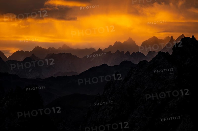 Montafon mountains with dramatic cloudy sky at sunrise, Tschagguns, Rätikon, Montafon, Vorarlberg, Austria, Europe