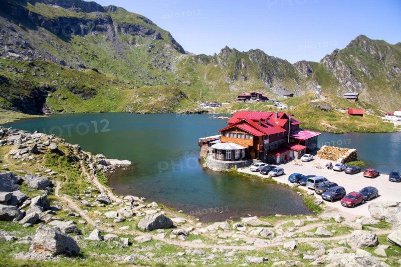 Romania: Lake Balea (Romanian: Balea Lac) from above. The lake is located at the summit of the Transfogarasch High Road in the Fogarasch Mountains on the border between Transylvania and Wallachia and is a popular excursion destination