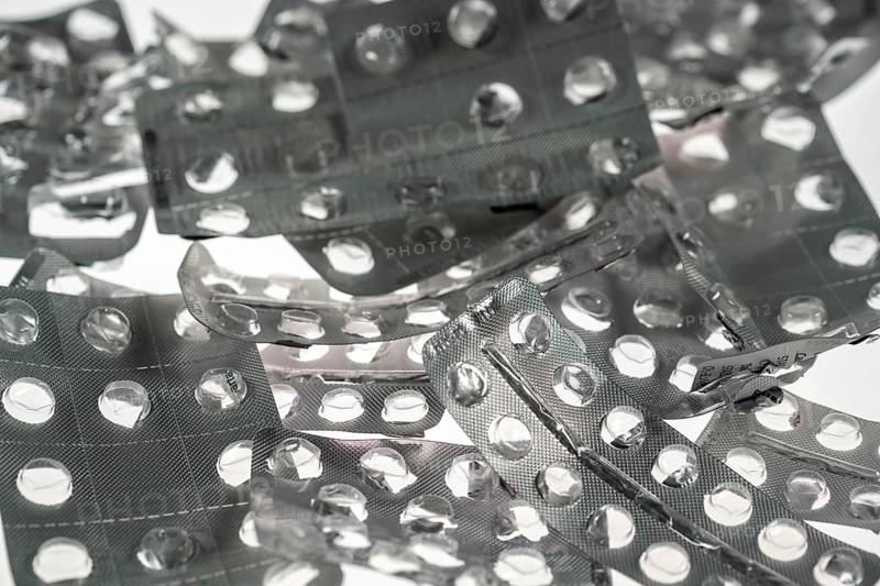 Empty, used medication packaging, pills, tablets