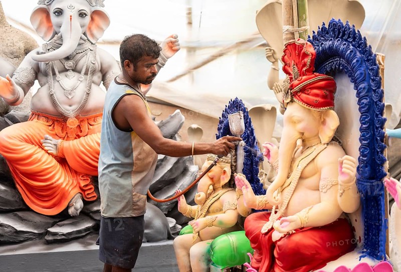 An artisan decorates an idol of the elephant-headed Hindu deity Ganesha at a workshop ahead of the Ganesh Chaturthi festival on September 5, 2024 in Guwahati, Assam, India, Asia