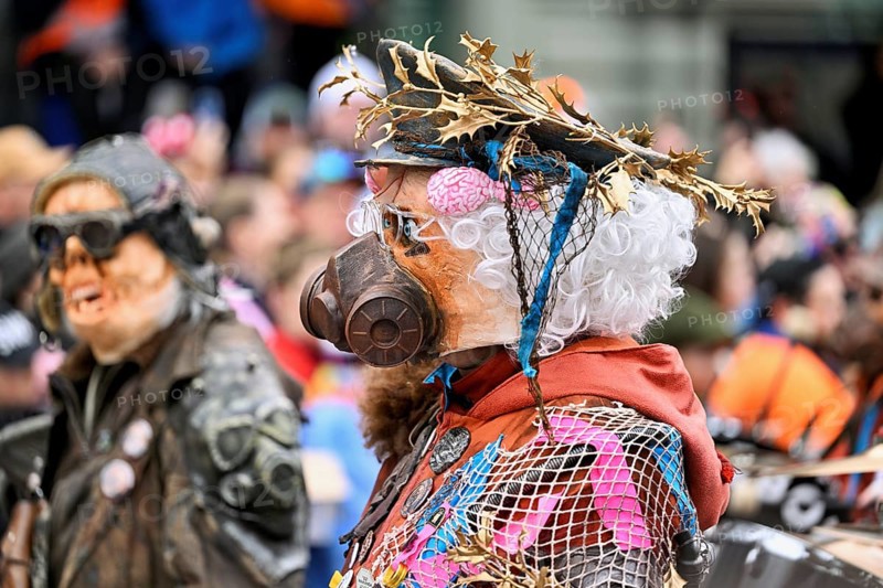 Person dressed up as a soldier with a gas mask at the Wey guild on Rose Monday, Güdismäntig, Lucerne Carnival 2024, Lucerne, Switzerland, Europe