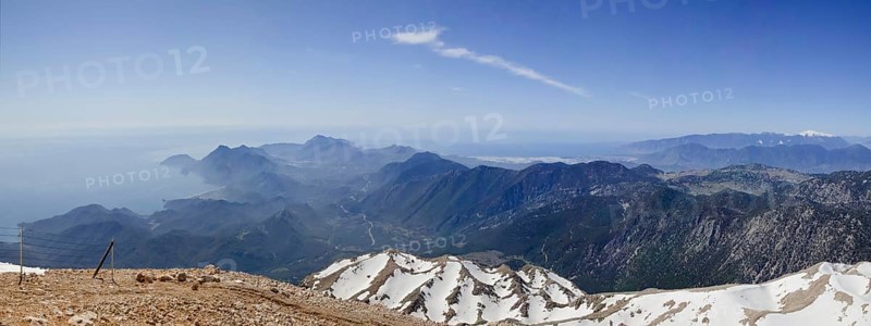 View of the Turkish Riviera from the snow-covered Tahtali Dagi, Turkey, Asia
