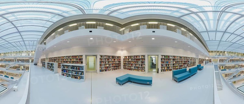 Modern library with glass roof and white stairs, surrounded by bookshelves in a bright open space, public library at Mailänder Platz, empty, panoramic view, Stuttgart, Germany, Europe