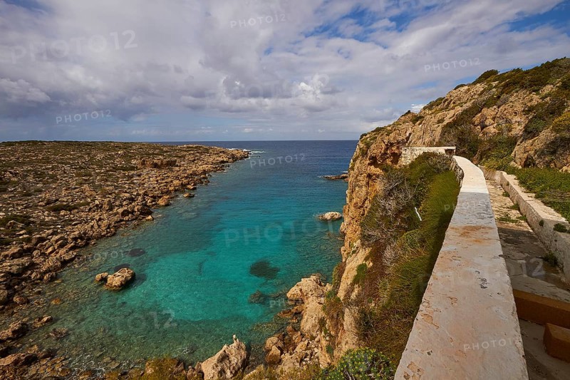 Bay, green sea, wall, toilet house, Chrissoskalitissa, rock monastery, Orthodox monastery, southwest tip, Chania province, Crete, Greece, Europe