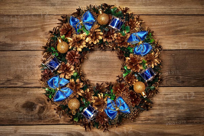 Christmas wreath on wooden background