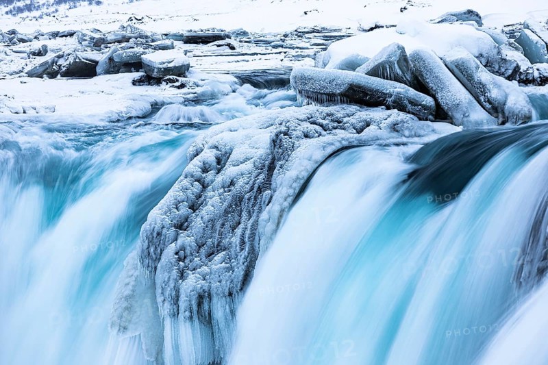 Godafoss waterfall, icy and snowy rock face, Northern Iceland Eyestra, Iceland, Europe