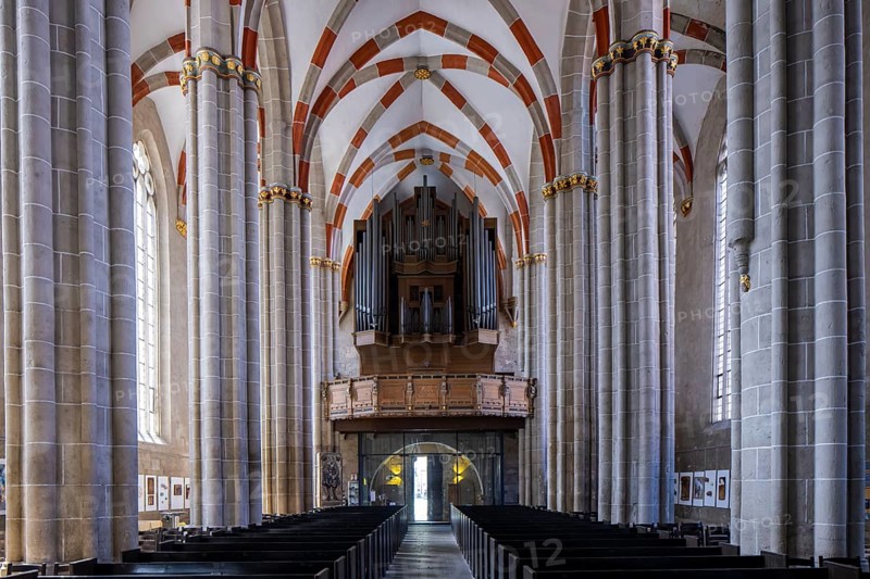 The Divi Blasii Church is a three-nave, cruciform hall church on the Untermarkt square in the town of Mühlhausen in Thuringia. The elaborately designed façade with tracery, pinnacles and a wheel window on the north side is located on an old trade route, Divi Blasii Church, Mühlhausen, Thuringia, Germany, Europe