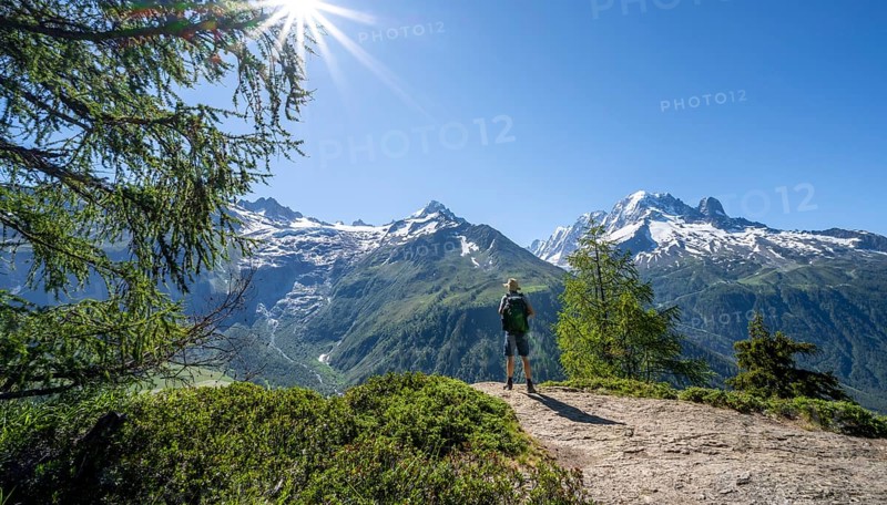 Mountaineer on hiking trail, mountain panorama with glaciated mountain peaks, Aiguille Verte, hike to Aiguillette des Posettes, Chamonix, Haute-Savoie, France, Europe