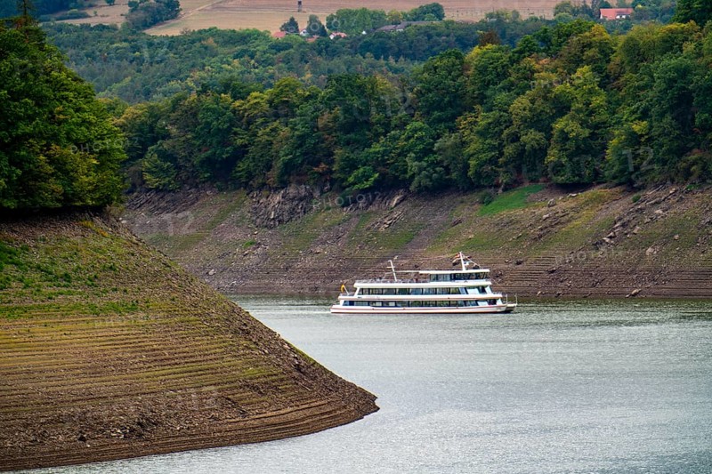 The Edersee, near Waldeck, the third largest reservoir in Germany, currently has only just under 13% of its normal level, the lake was last full in May 2022, dried up due to lack of rain, excursion boat Edersee Star, the water level is a good 25 metres below the normal level, Hesse, Germany, Europe