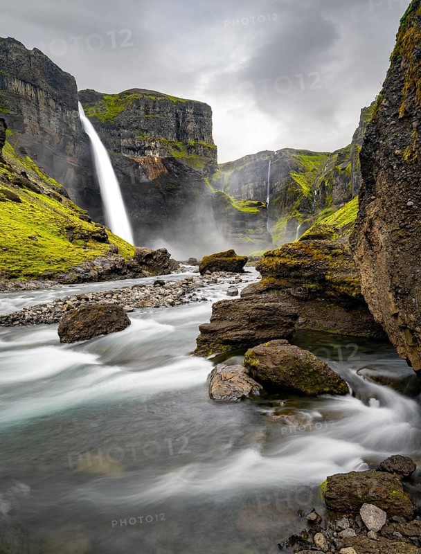 Haifoss and Granni waterfall at a canyon, Fossá í Þjórsárdal, with river í Þjórsárdal, long exposure, dramatic landscape, Hekla, Iceland, Europe