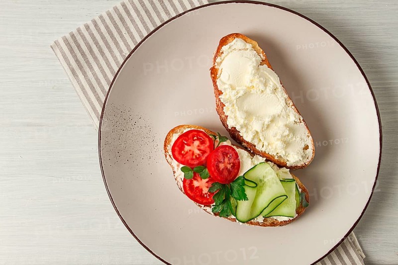 Sandwich, with cream cheese, homemade, on a cutting board, rustic style, no people, selective focus, breakfast