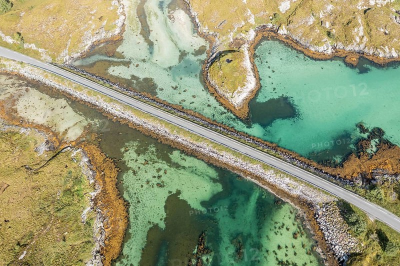 Aerial view of road on a dam connecting islands at the norwegian coast, Norway, Europe