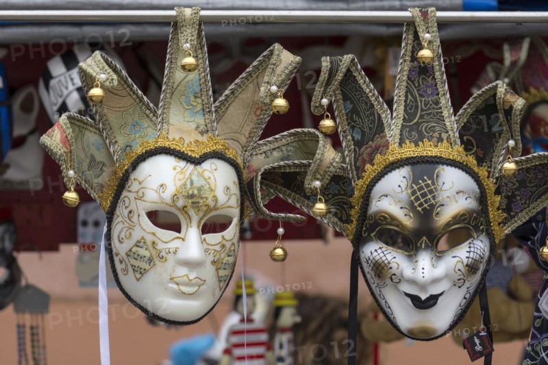 Venetian carnival masks in front of a shop, Burano, Veneto, Italy, Europe