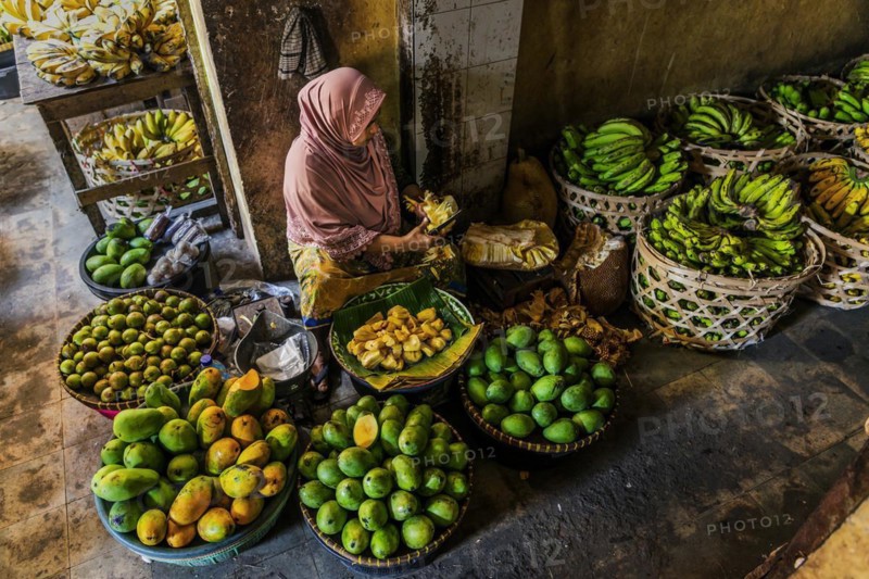 Traditional authentic food market, vendor, woman, fruit, vegetable, fresh, food, nutrition, sale, trade, bazaar, authentic, disease vector, food law, food control, stall, Asian, vegetable market, local, hygiene, virus, tradition, traditional, health, marketplace, market hall, tropical, travel, tourism, culture, poverty, presentation, cleanliness, person, Muslim, Islam, Lombok, Indonesia, Asia
