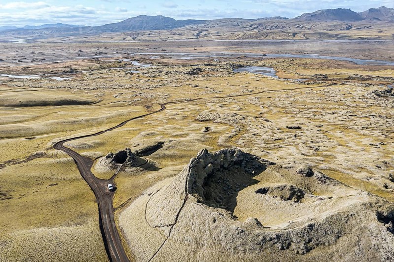 Craters of the Laki crater row, top down view, viewing platform, 4x4 car on road F206, Skafta river in the back, Iceland, Europe