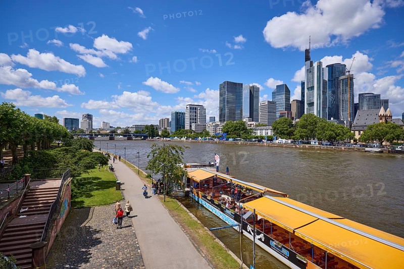 Riverside promenade on the Main with high-rise buildings and Untermainbrücke bridge in Frankfurt am Main, Hesse, Germany, Europe