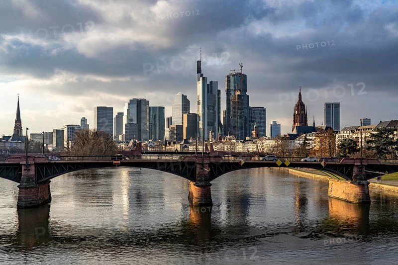 Skyline of the city centre of Frankfurt am Main, river Main, Ignatz-Bubis-Bridge, dusk, Hesse, Germany, Europe