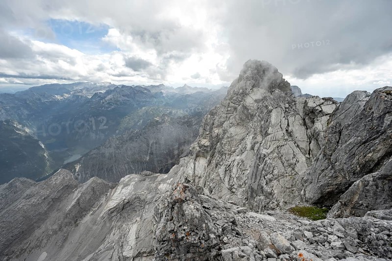 Clouds around a narrow rocky ridge, Watzmann crossing to Watzmann Mittelspitze, view of mountain panorama, Berchtesgaden National Park, Berchtesgaden Alps, Bavaria, Germany, Europe