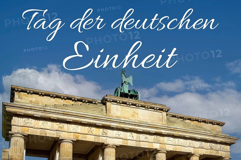 Brandenburg Gate in Berlin with lettering DAY OF GERMAN UNITY