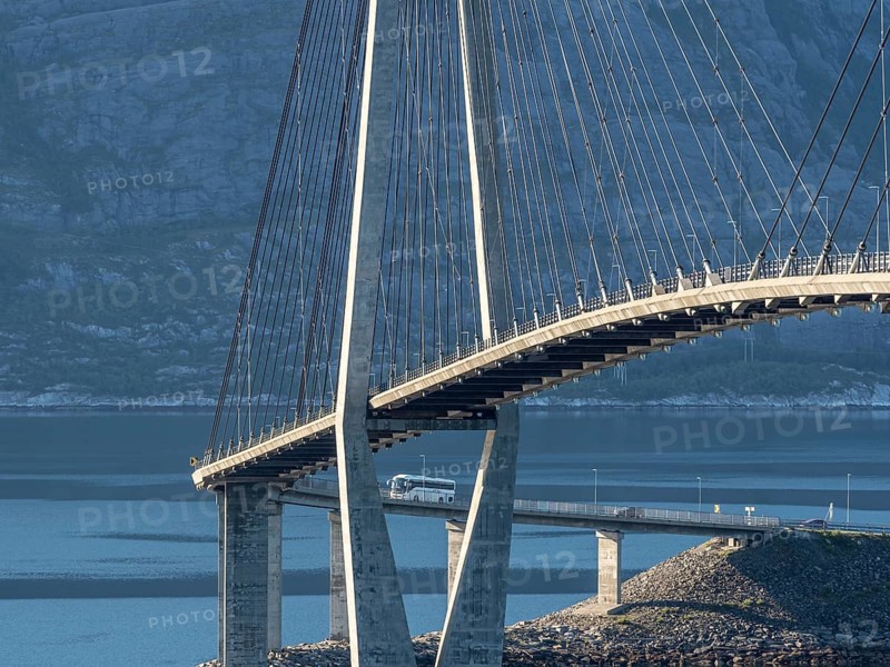 Helgeland bridge, connecting Sandnessjøen with the norwegian mainland, tourbus on bridge, Norway, Europe