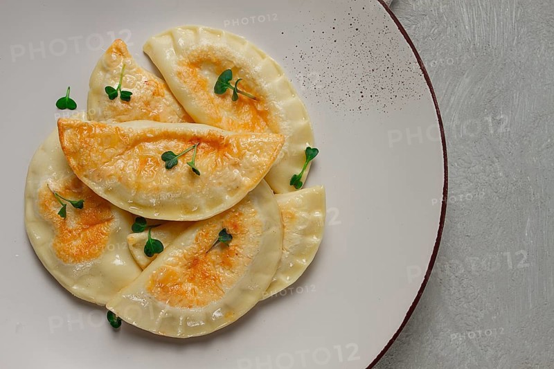 Pierogi, a traditional dish of Polish cuisine, dumplings, top view, close-up, no people