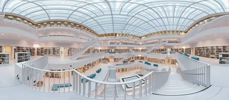 Galeriesaaal, Modern library with glass roof and white stairs, surrounded by bookshelves in a bright open space, 360 degree panorama, public library am Mailänder Platz, empty, Stuttgart, Germany, Europe
