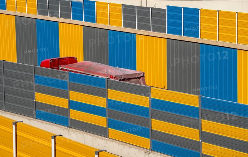 Colourful noise barriers on the A52 motorway, at the Essen-Rüttenscheid junction, the noise barriers were rebuilt in a colourful design as part of the motorway renovation, North Rhine-Westphalia, Germany, Europe