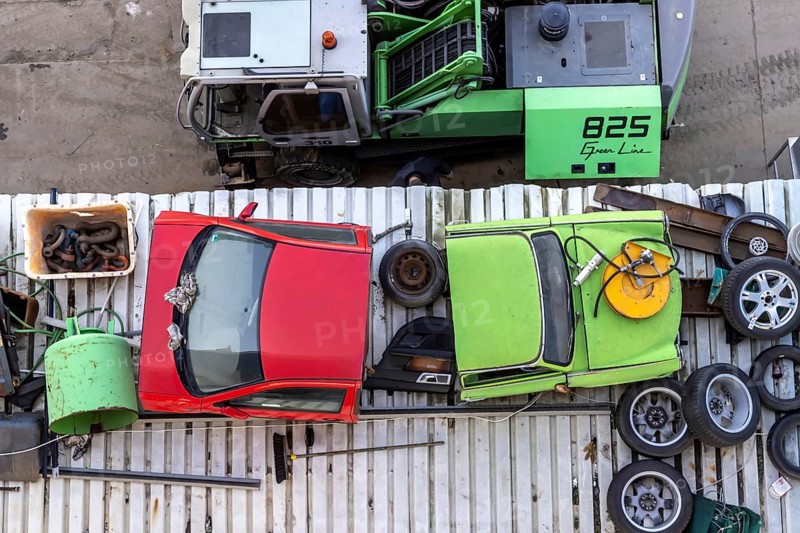 Metals are stored in a scrapyard in the harbour: scrap metal is a valuable raw material for recycling. Including a scrap-ready Trabant vehicle. Mannheim, Baden-Württemberg, Germany, Europe