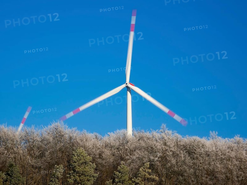 Wind turbines, in the middle of a hoarfrost covered forest, beside Zierenberg in the winter, abstract image, North Hesse, Germany, Europe
