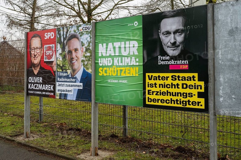 Board with election posters, SPD, CDU, Bündnis90 Die Grünen, FDP, Bundestag election 2025, Kamen, North Rhine-Westphalia, Germany, Europe