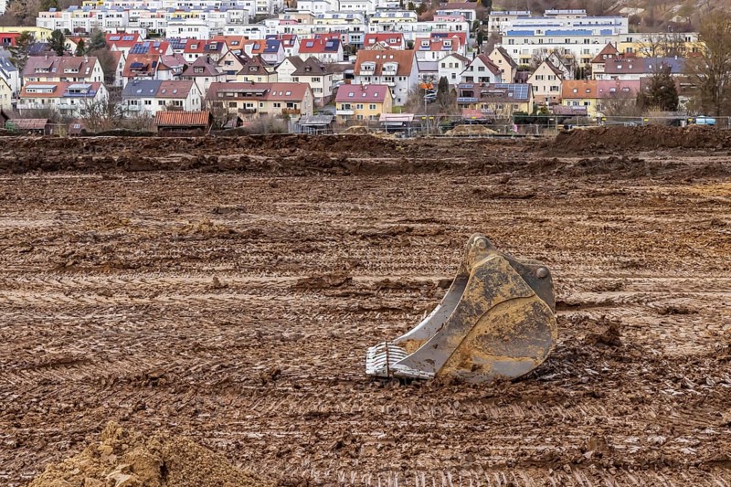 Construction work for a new development area for 460 flats in the new Böckinger Strasse neighbourhood in the Zuffenhausen-Rot district. Sealing of almost six hectares of farmland. Symbolic photo. The buildings are projects of the International Building Exhibition IBA27 in Stuttgart. Stuttgart, Baden-Württemberg, Germany, Europe