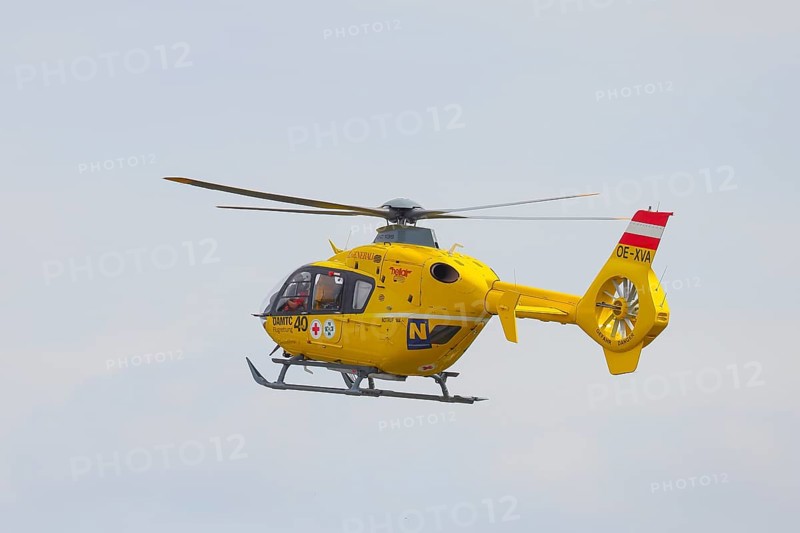 The ÖAMTC rescue helicopter Christophorus 3 of the type Eurocopter 135, air rescue, flying, Lake Neusiedl National Park, Burgenland, Austria, Europe