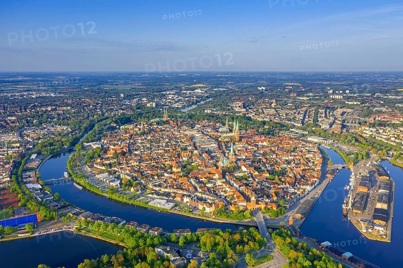 Aerial view over the river Trave and church towers in the old town of the Hanseatic City of Lübeck in spring, Schleswig-Holstein, Germany, Europe