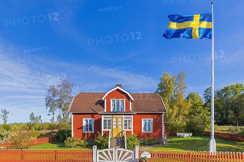 Katthult, red wooden farm house with fence from Astrid Lindgren's tales about Emil of Lönneberga at Gibberyd near Rumskulla, Vimmerby, Småland, Sweden, Europe