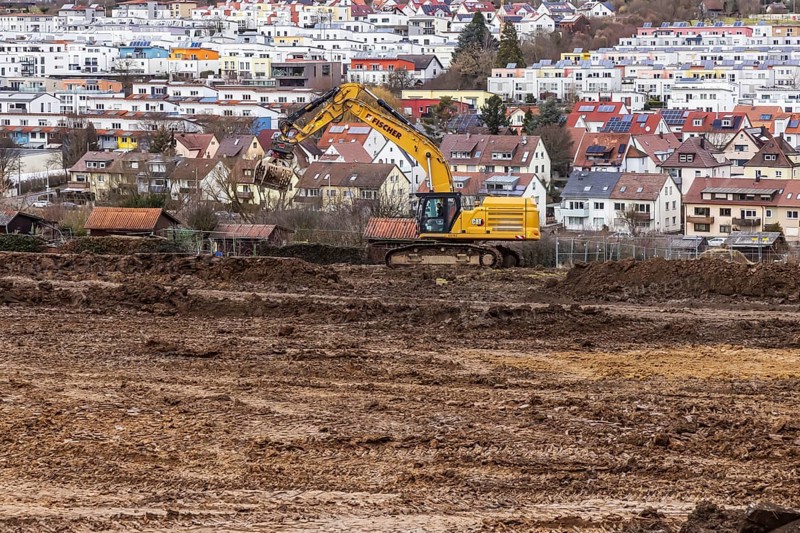 Construction work for a new development area for 460 flats in the new Böckinger Strasse neighbourhood in the Zuffenhausen-Rot district. Sealing of almost six hectares of farmland. Symbolic photo. The buildings are projects of the International Building Exhibition IBA27 in Stuttgart. Stuttgart, Baden-Württemberg, Germany, Europe