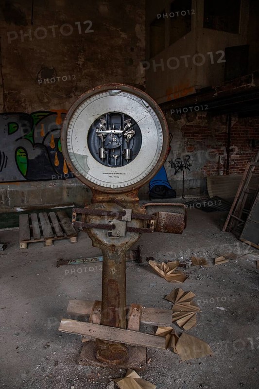 Old abandoned paper factory. Historic and typical factory building as a lost place. Destruction and decay are damaging the substance. Original machines and objects can be found here in Sweden