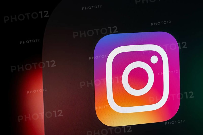 A close up of an iPad screen displaying the instagram app icon