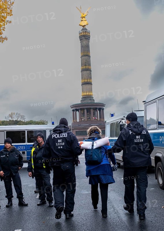 Germany, Berlin, 28 October 2023, Removal of a woman by police officers, Victory Column, Europe