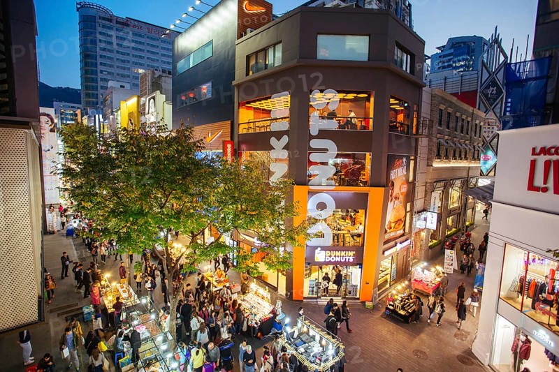 Seoul, South Korea, October 23, 2014: Myeong-dong is a vibrant shopping and tourism district in Jong-gu, central Seoul South Korea, Asia