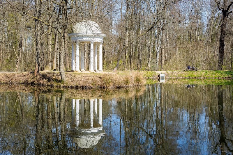 Diana Temple in Lützschena Castle Park with reflection in the water, Leipzig, Saxony, Germany, Europe